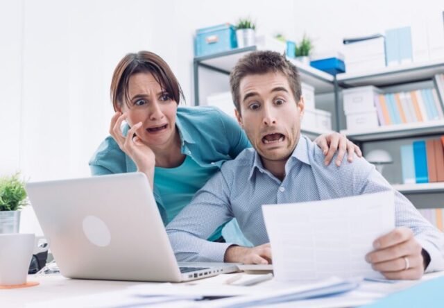 Stressed,Young,Couple,Checking,Bills,,Taxes,And,Bank,Account,Balance,